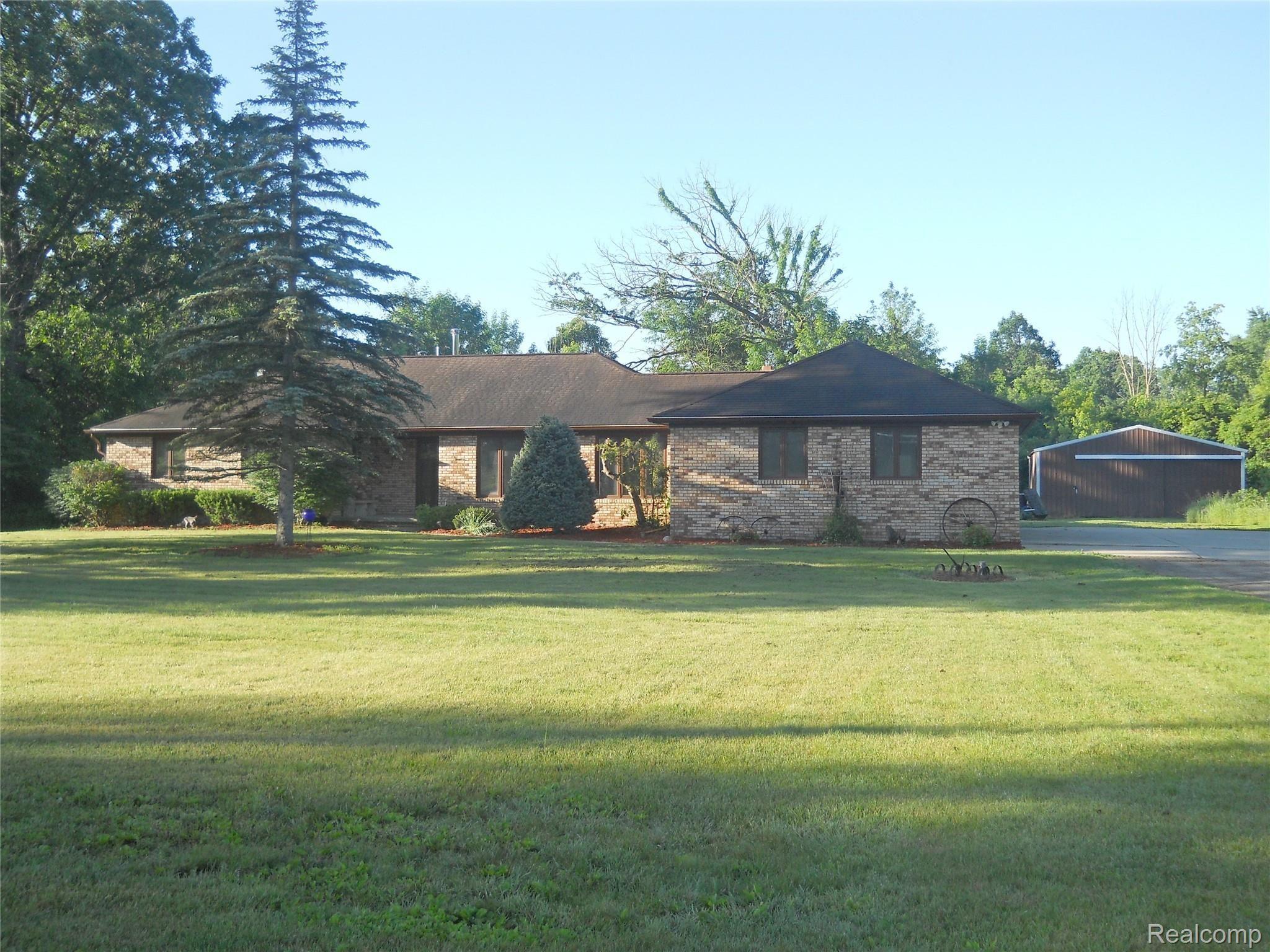 5929 Layton Road Fowlerville, MI 48836 - Photo 1 of 24 Layton front