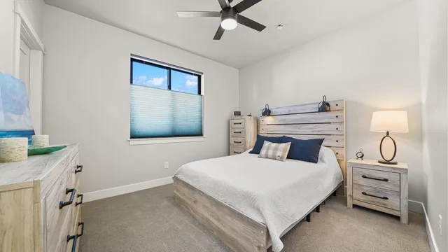 a bedroom with a bed and furniture