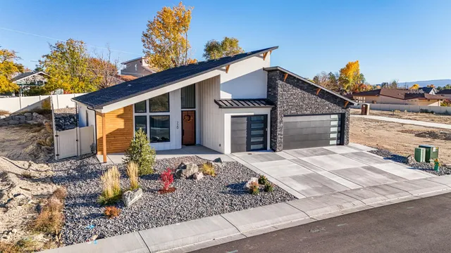 a front view of a house with entertaining space