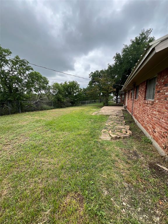 105 Oak Ridge Terrace Weatherford, TX 76086 - Photo 19 of 21 a view of a wooden floor and a lake view