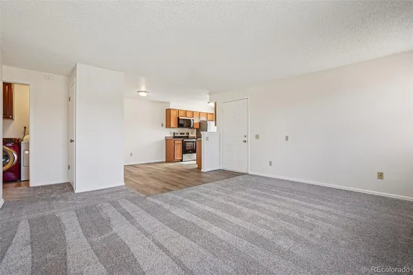 a view of a room with an empty space