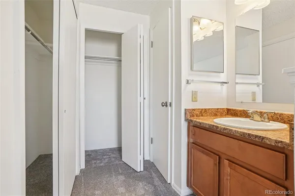 a bathroom with a toilet and shower