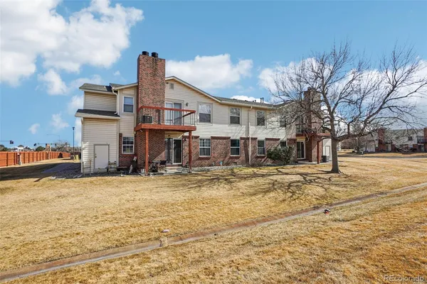 a view of a patio with swimming pool
