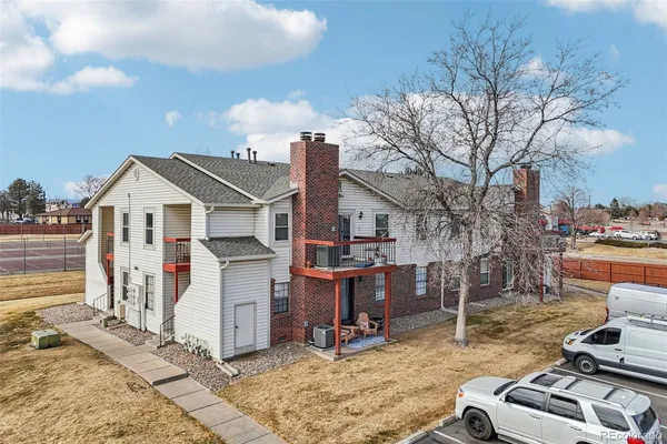 an aerial view of a house with a ocean view