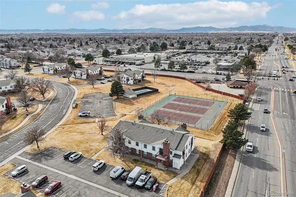an view of residential houses with car parked