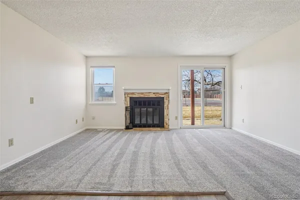 a view of a swimming pool with a deck