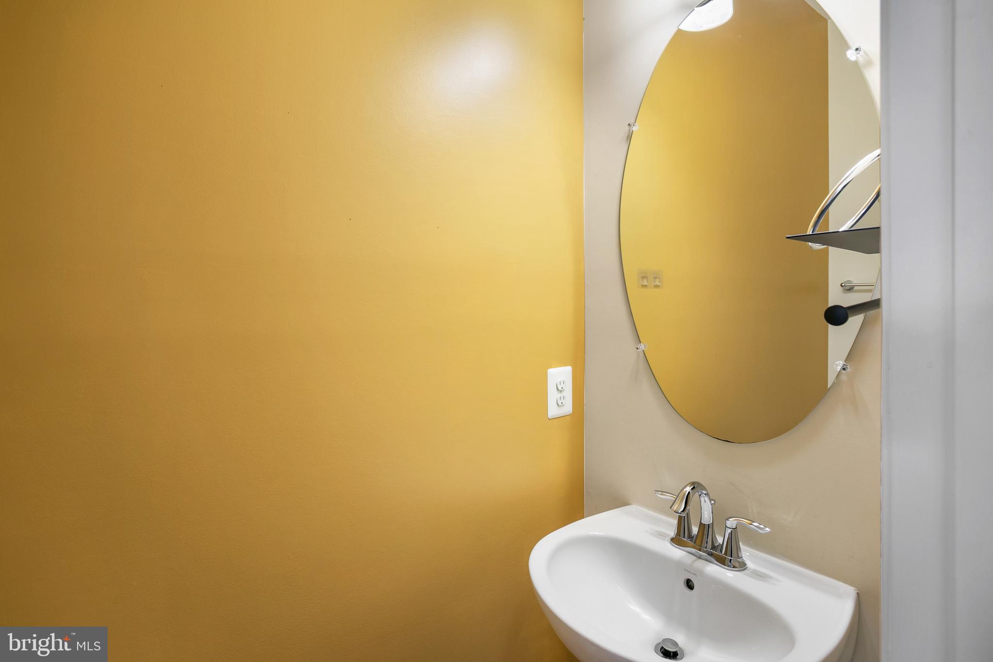 2885 Falkirk Alley Bryans Road, MD 20616 - Photo 15 of 43 a bathroom with a sink and a mirror