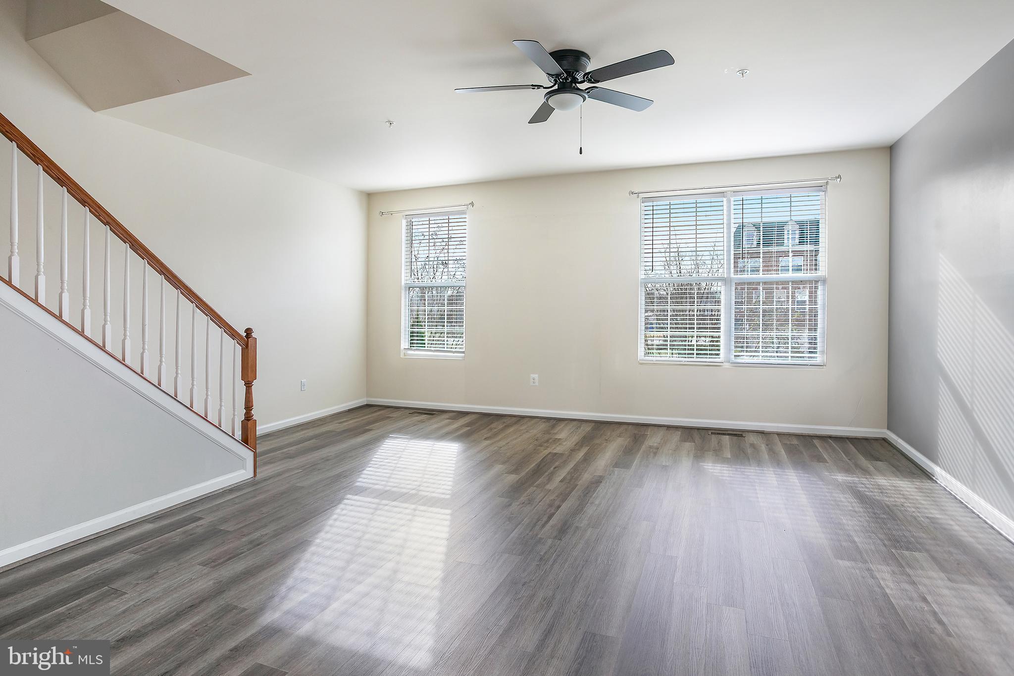 2885 Falkirk Alley Bryans Road, MD 20616 - Photo 17 of 43 a view of empty room with wooden floor and fan