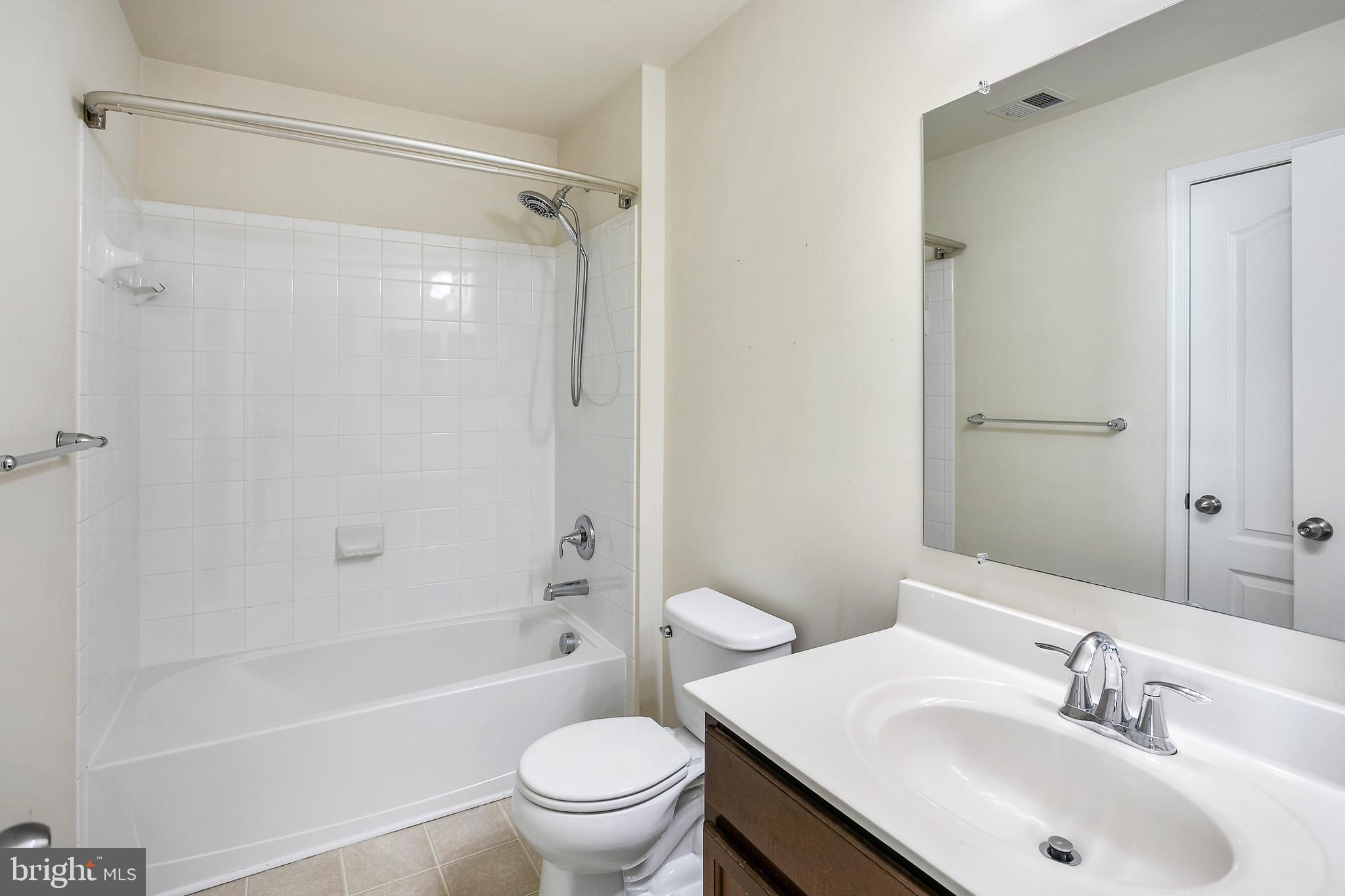 2885 Falkirk Alley Bryans Road, MD 20616 - Photo 27 of 43 a bathroom with a sink toilet and shower