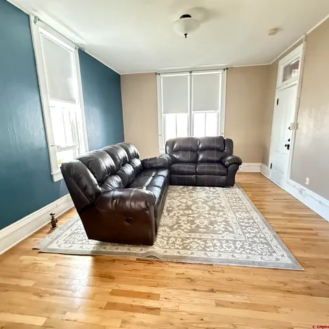 a view of a house with garden and yard