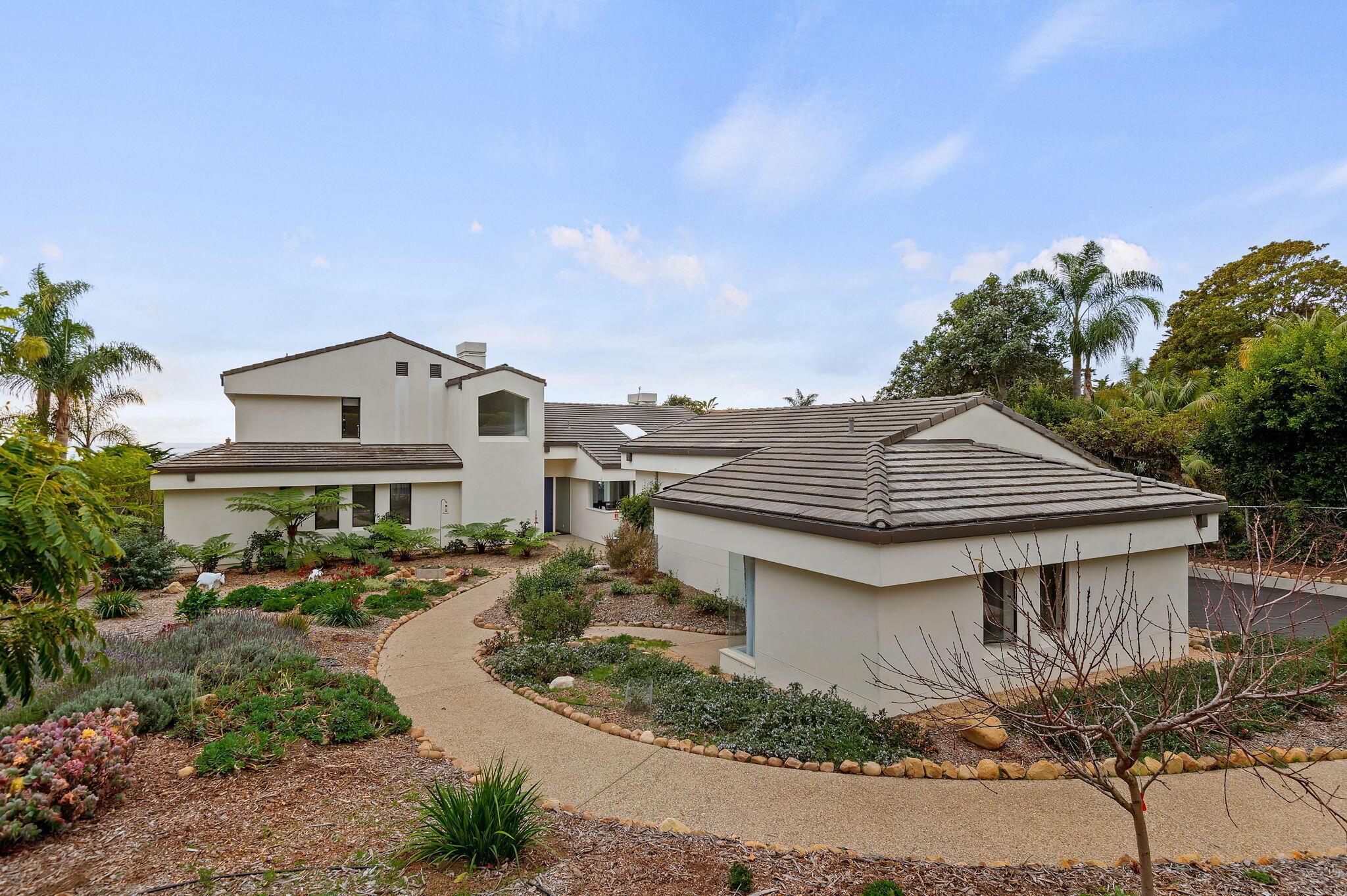 4161 Creciente Drive Santa Barbara, CA 93110 - Photo 1 of 1 a aerial view of a house with a yard and potted plants