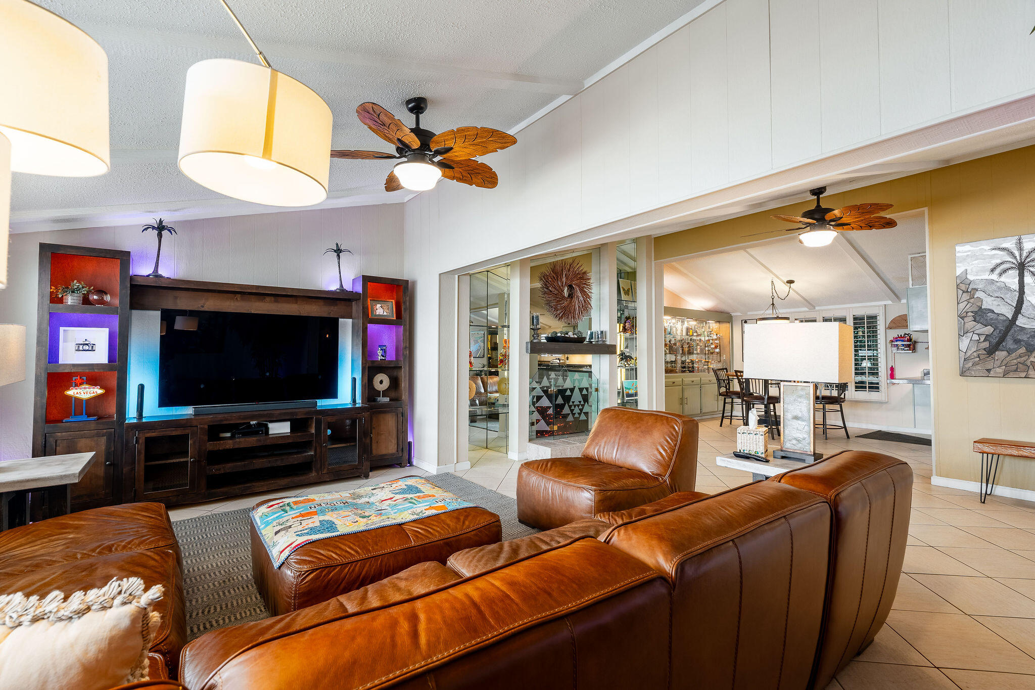 109 International Boulevard Rancho Mirage, CA 92270 - Photo 12 of 64 a living room with furniture and a flat screen tv