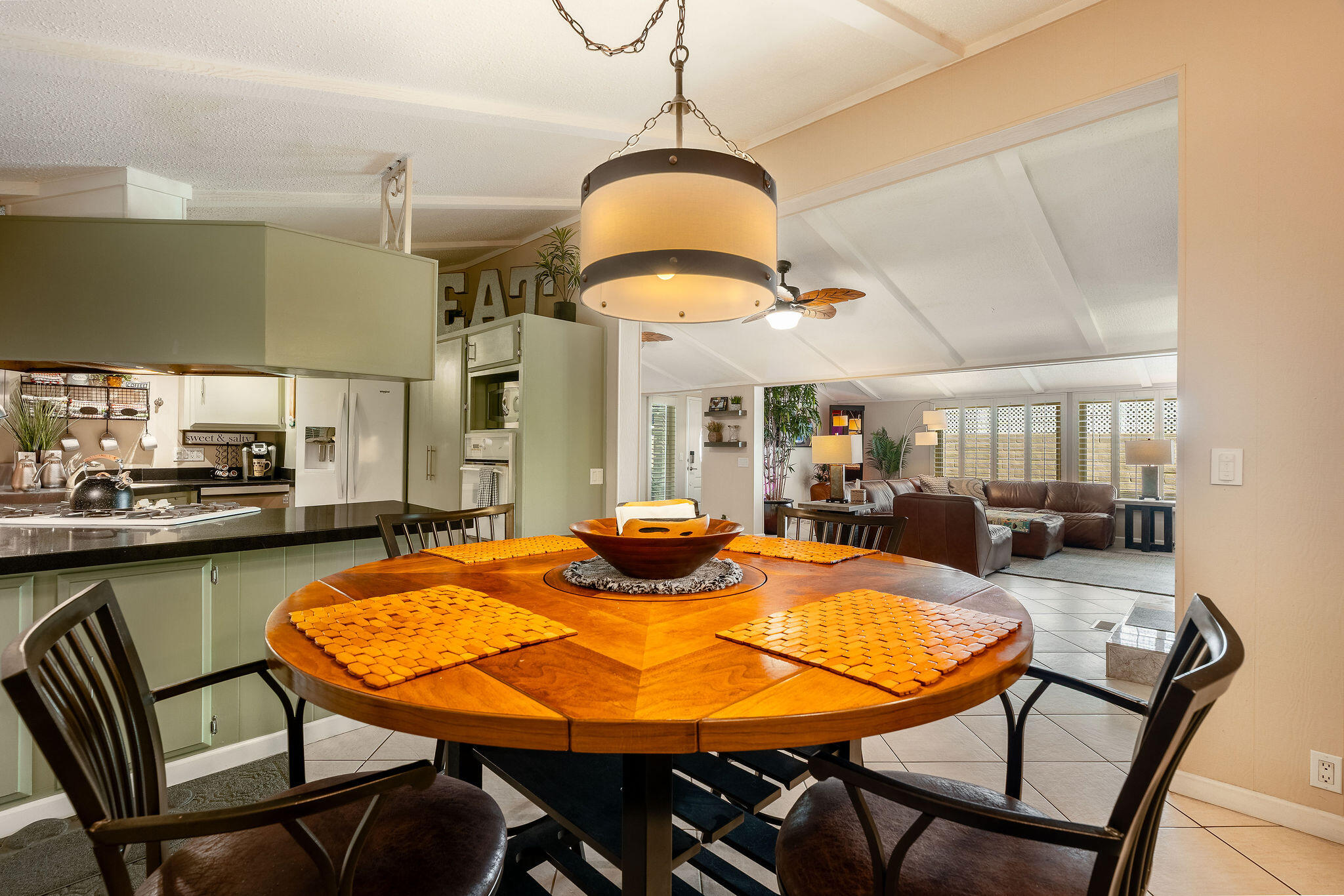 109 International Boulevard Rancho Mirage, CA 92270 - Photo 17 of 64 a dining room with furniture and window