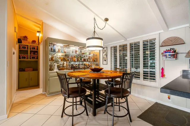 a view of bathroom with a sink and a mirror