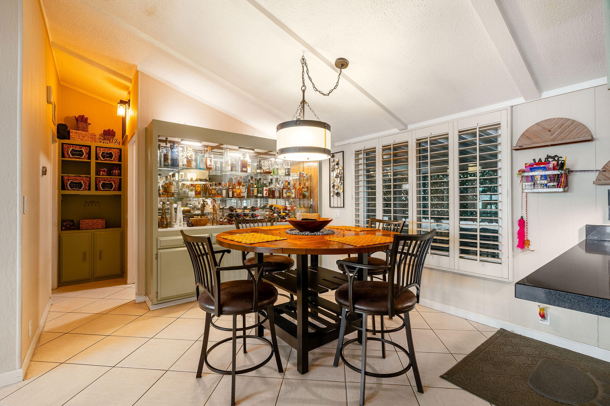 109 International Boulevard Rancho Mirage, CA 92270 - Photo 21 of 64 a dining room with furniture window and wooden floor
