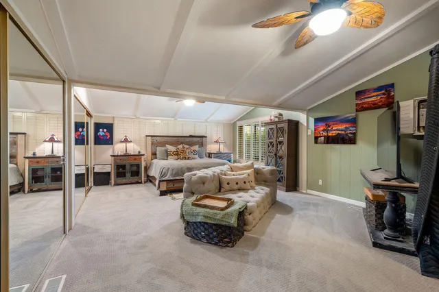 a bathroom with a shower toilet and sink