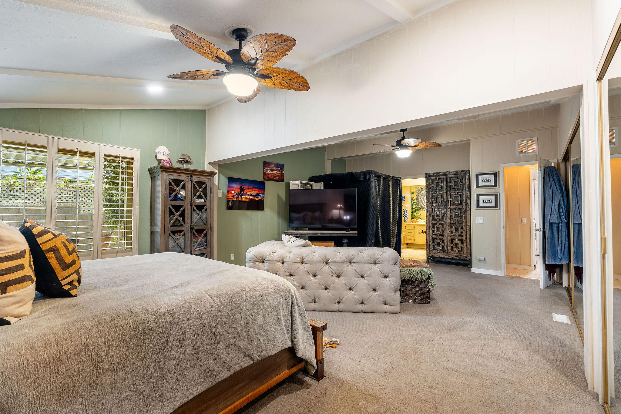 109 International Boulevard Rancho Mirage, CA 92270 - Photo 24 of 64 a bedroom with bed and tv