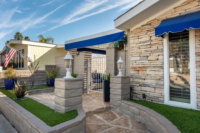 a outdoor living space with patio furniture and a potted plant