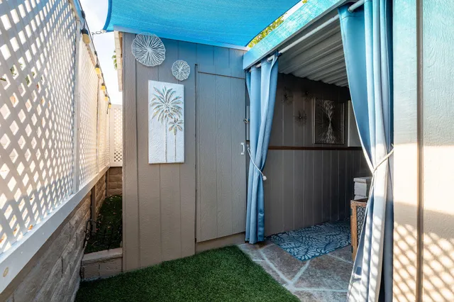 a view of swimming pool with a patio