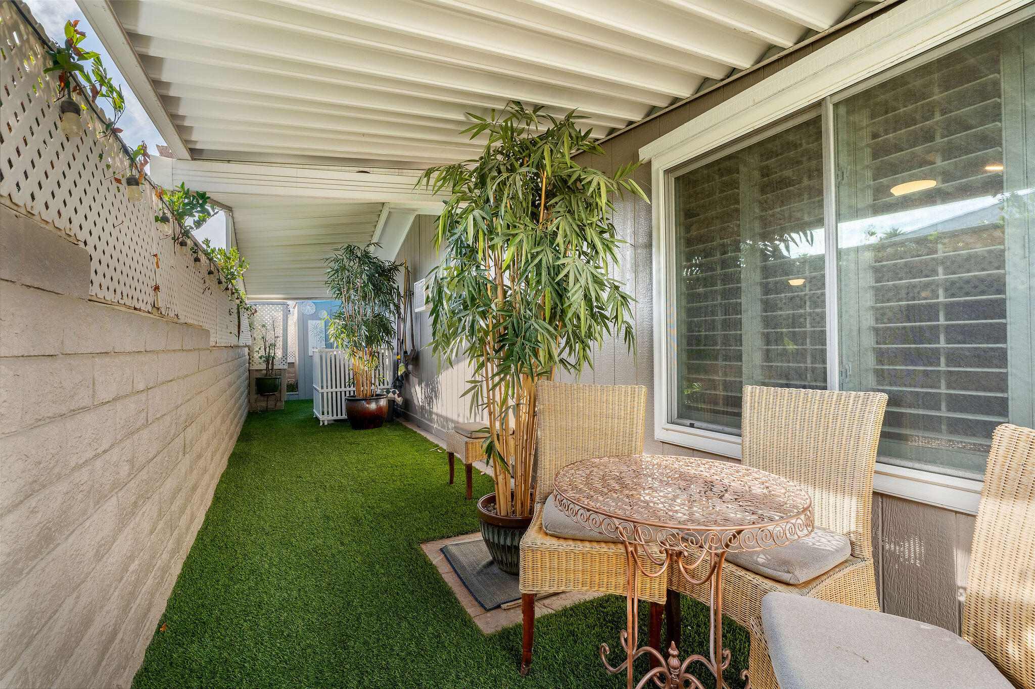 109 International Boulevard Rancho Mirage, CA 92270 - Photo 44 of 64 a backyard of a house with seating space