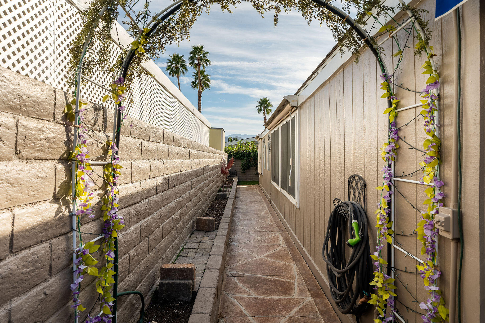 109 International Boulevard Rancho Mirage, CA 92270 - Photo 45 of 64 a view of a pathway of a house