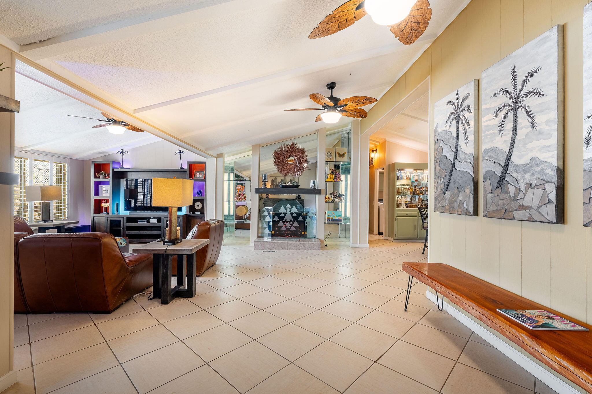 109 International Boulevard Rancho Mirage, CA 92270 - Photo 10 of 64 a lobby with furniture and a flat screen tv