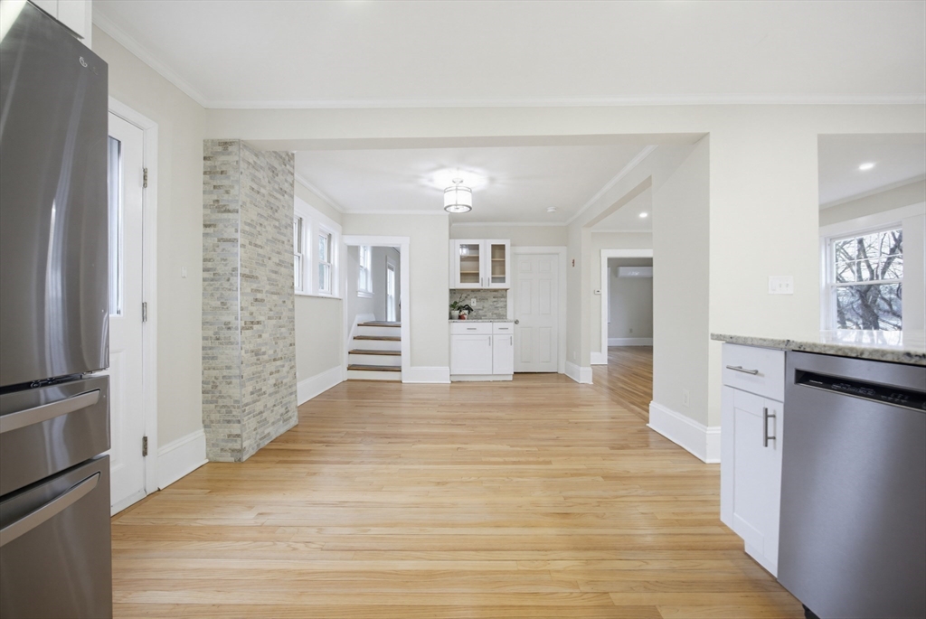 29 Shawmut Terrace Framingham, MA 01702 - Photo 14 of 42 a view of a kitchen cabinets and wooden floor