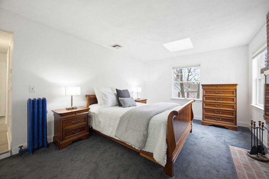 29 Shawmut Terrace Framingham, MA 01702 - Photo 24 of 42 a bedroom with a bed and a television