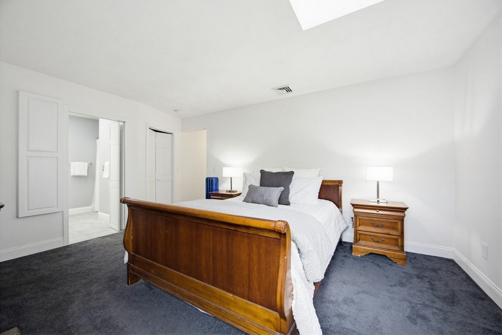 29 Shawmut Terrace Framingham, MA 01702 - Photo 26 of 42 a bedroom with a bed and a window