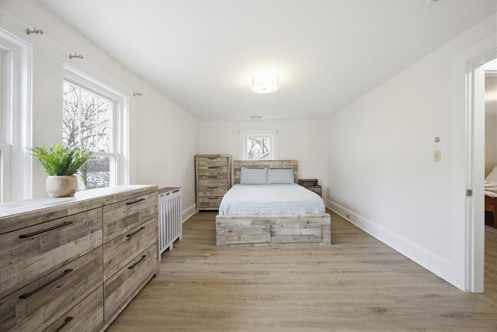 29 Shawmut Terrace Framingham, MA 01702 - Photo 29 of 42 a spacious bedroom with a bed and window