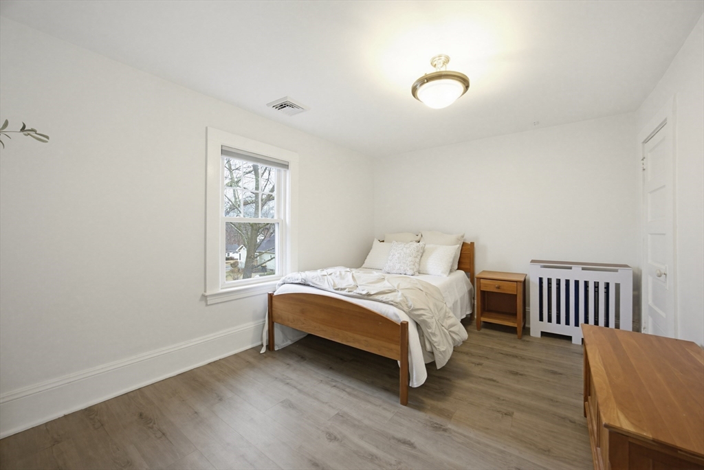29 Shawmut Terrace Framingham, MA 01702 - Photo 31 of 42 a bedroom with a bed and a window