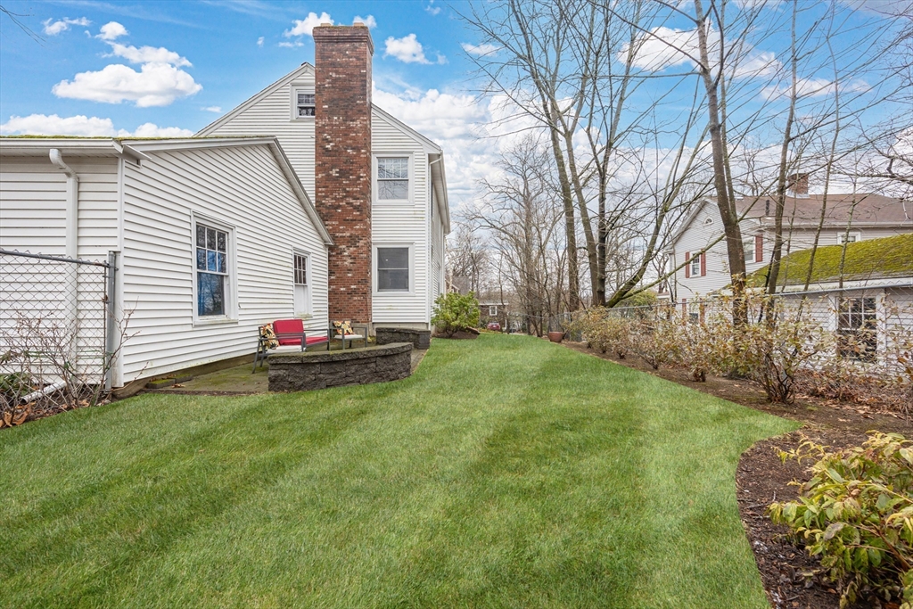 29 Shawmut Terrace Framingham, MA 01702 - Photo 35 of 42 a backyard of a house with table and chairs