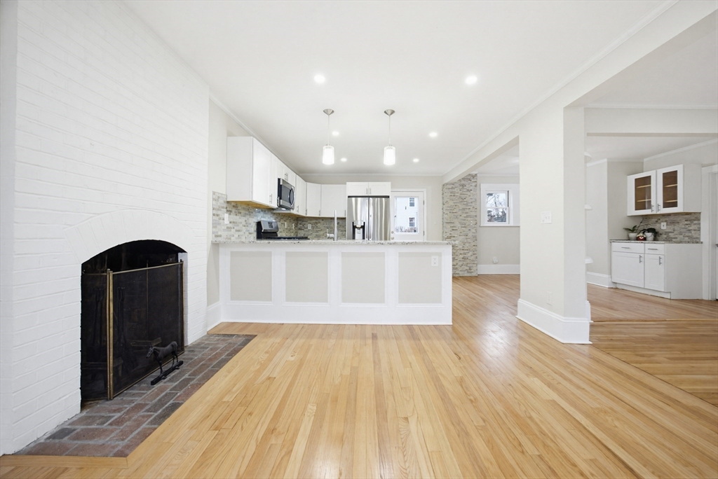 29 Shawmut Terrace Framingham, MA 01702 - Photo 10 of 42 a large kitchen with cabinets and stainless steel appliances