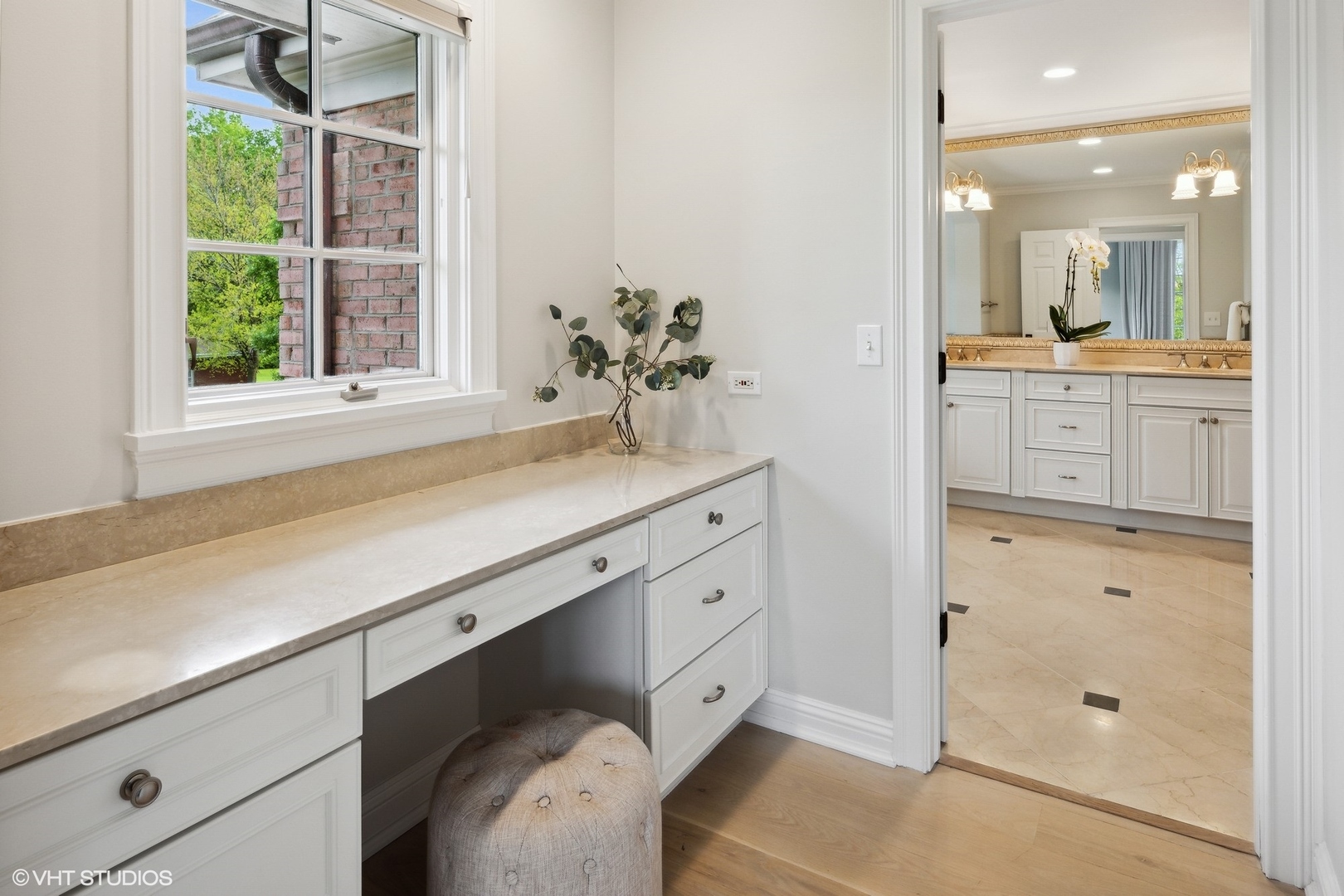 480 Wagner Road Northfield, IL 60093 - Photo 30 of 53 a bathroom with a shower sink and mirror with window