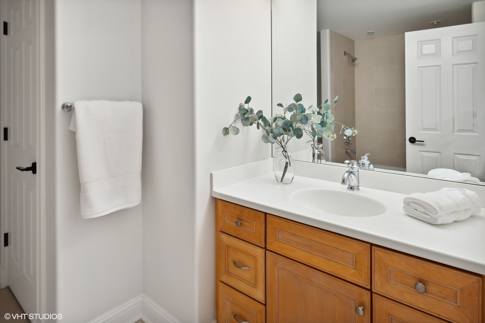 480 Wagner Road Northfield, IL 60093 - Photo 42 of 53 a bathroom with a sink and a mirror