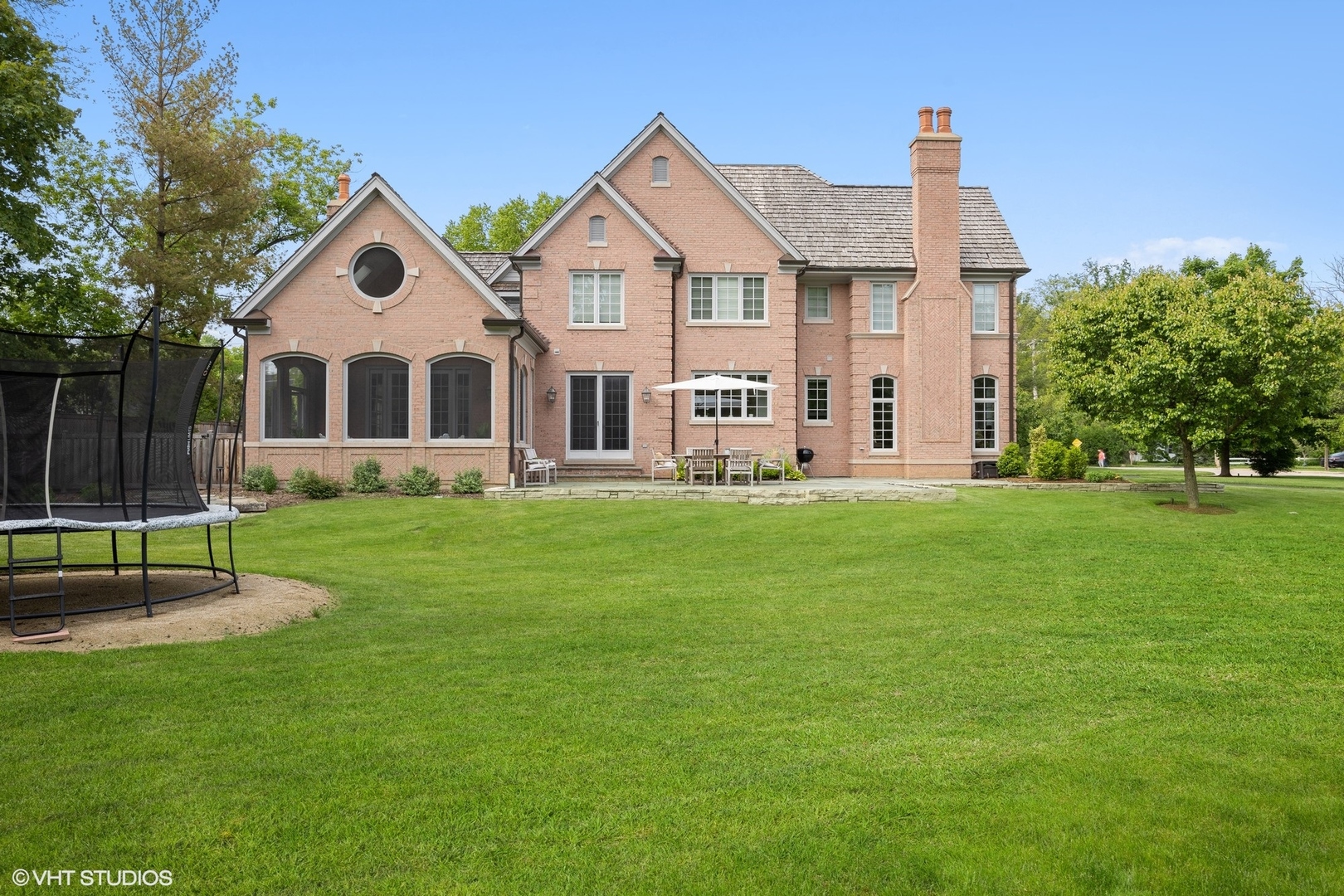 480 Wagner Road Northfield, IL 60093 - Photo 44 of 53 a front view of a house with a yard and trees