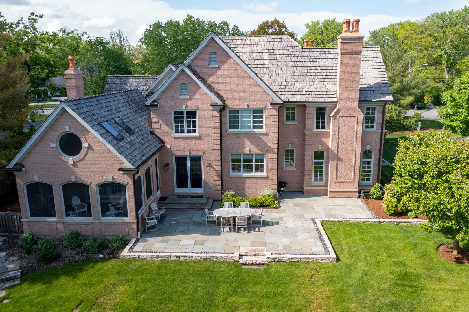 480 Wagner Road Northfield, IL 60093 - Photo 48 of 53 a view of a house with a yard and sitting area