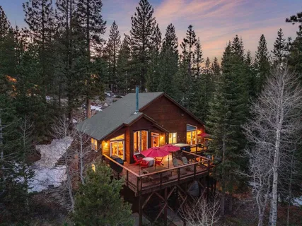aerial view of a house with a yard