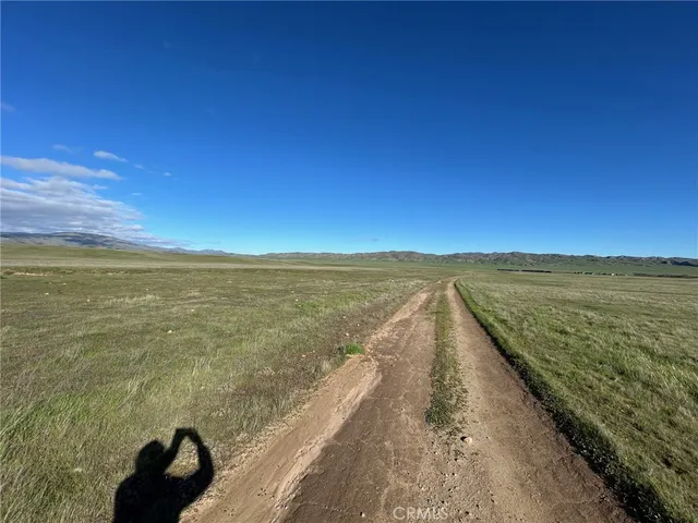 a view of an ocean and a nearby beach