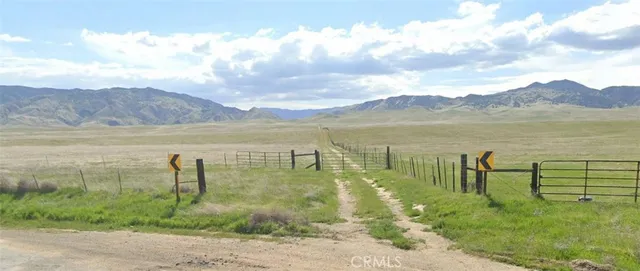 a view of a lake with a mountain in the background