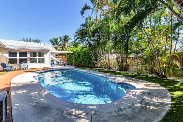 a view of a house with swimming pool