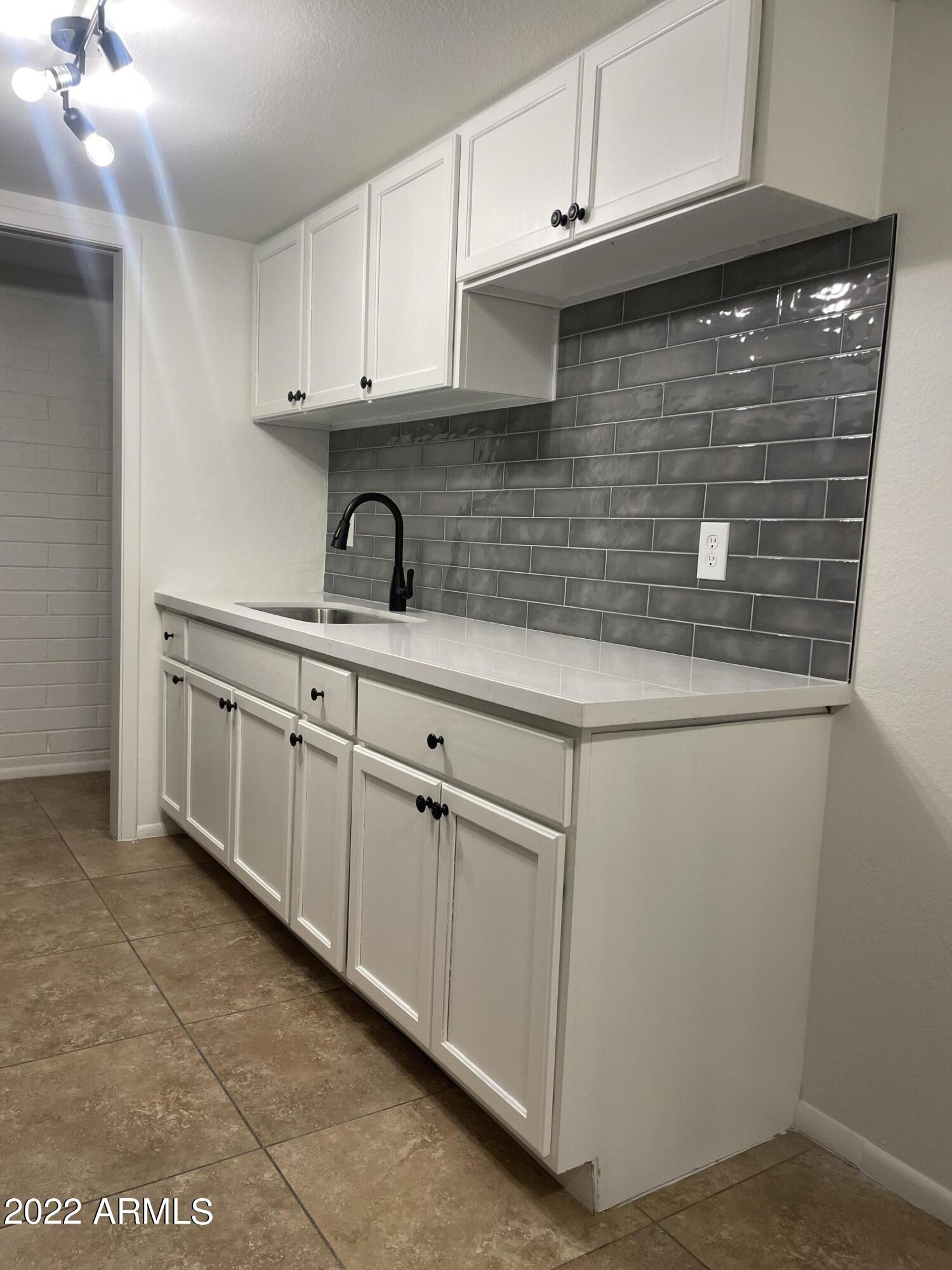 4027 West Wonderview Road Phoenix, AZ 85019 - Photo 1 of 11 Kitchen