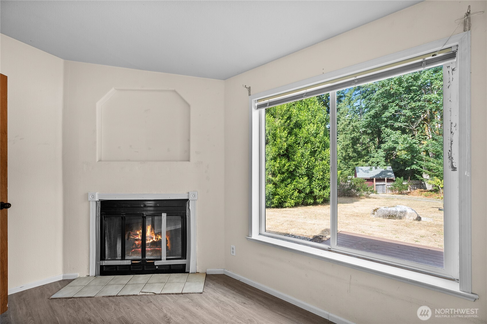 1870 Northwest Vaa Road Poulsbo, WA 98370 - Photo 18 of 40 a view of a room that has a fireplace