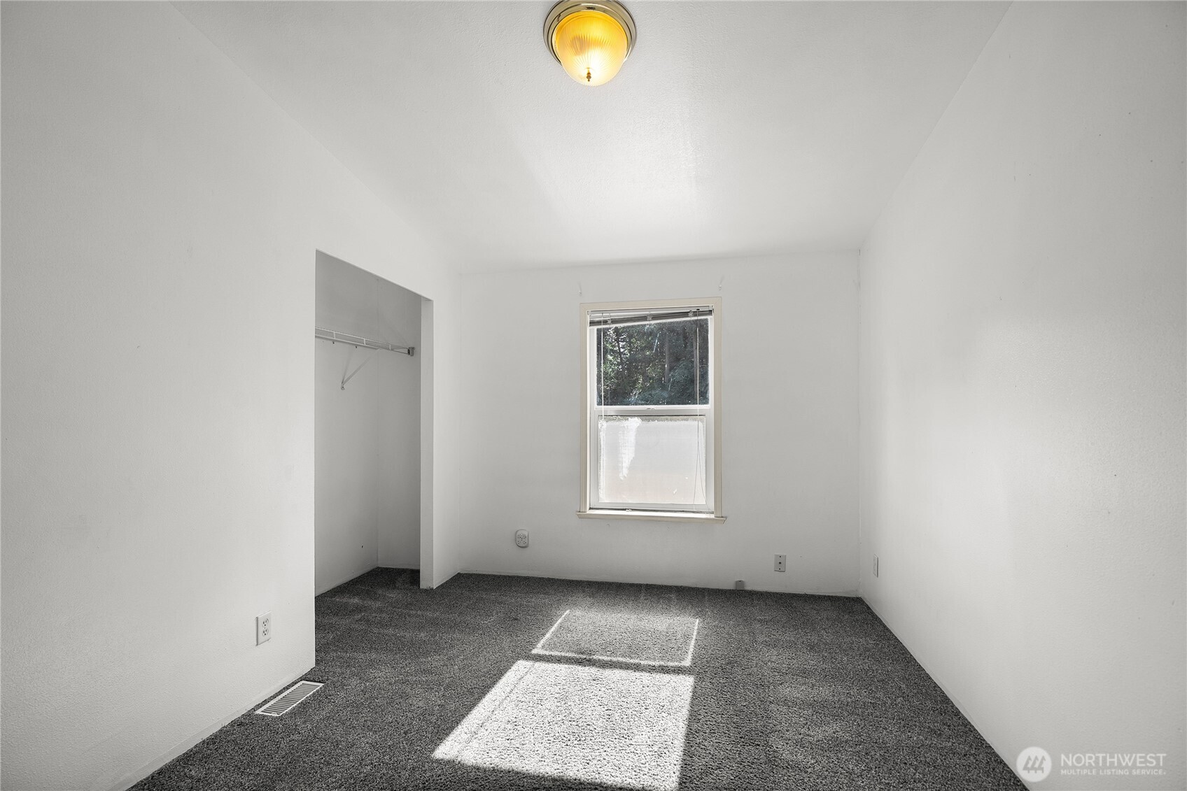 1870 Northwest Vaa Road Poulsbo, WA 98370 - Photo 27 of 40 an empty room with window and white walls