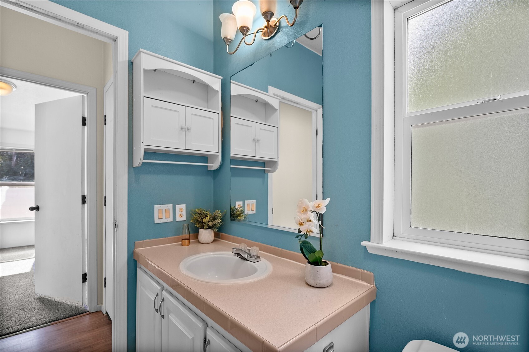 1870 Northwest Vaa Road Poulsbo, WA 98370 - Photo 29 of 40 a bathroom with a sink and a mirror