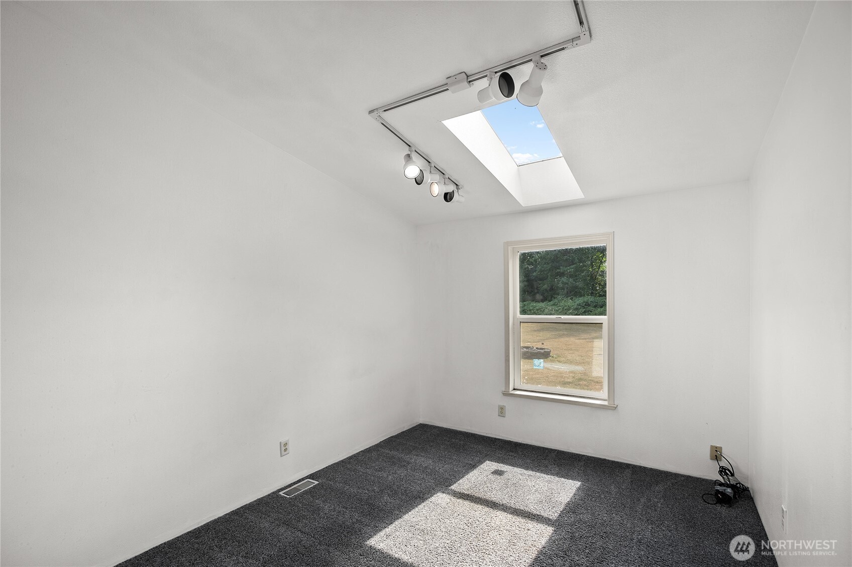 1870 Northwest Vaa Road Poulsbo, WA 98370 - Photo 30 of 40 an empty room with windows