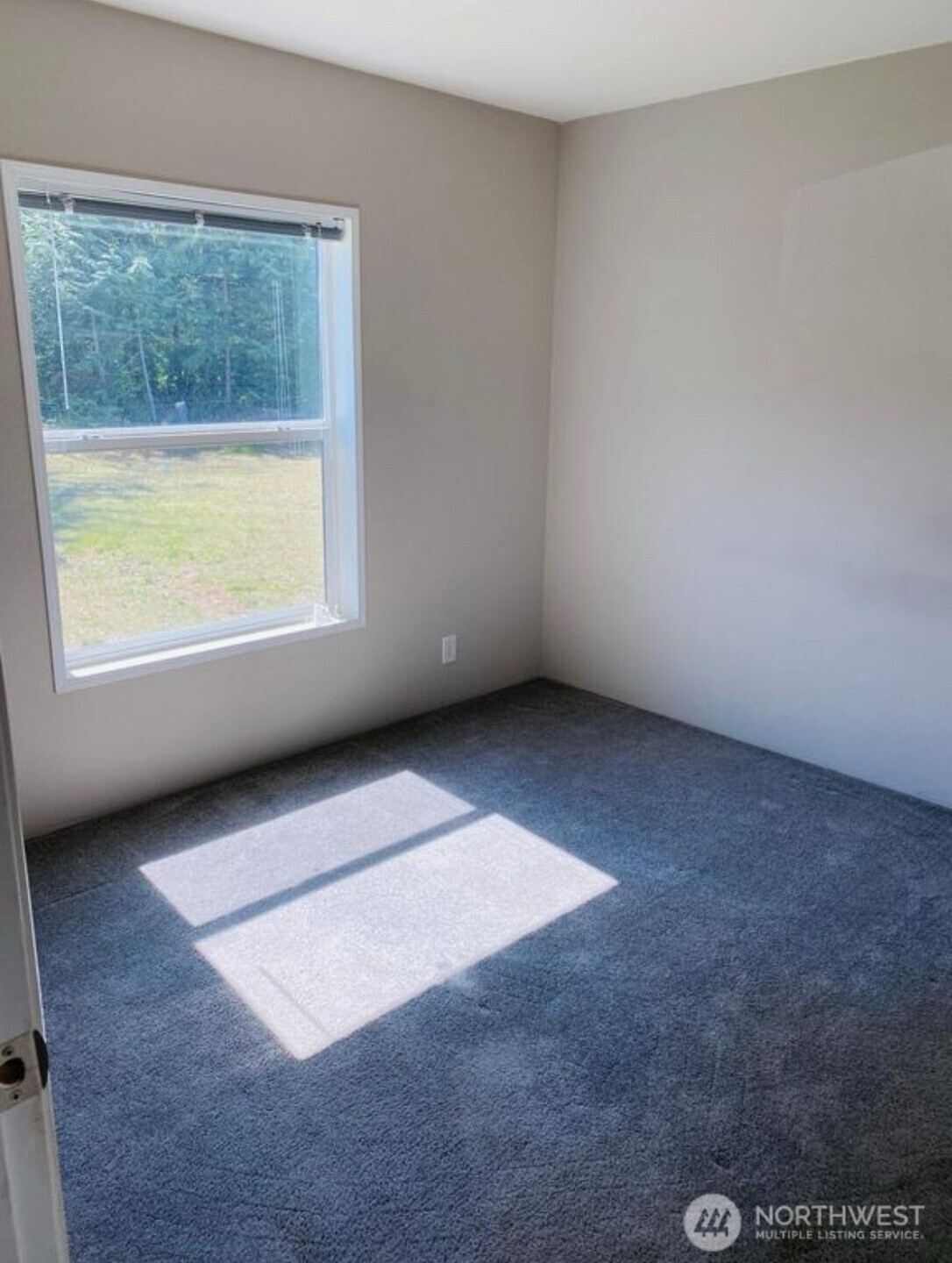 1870 Northwest Vaa Road Poulsbo, WA 98370 - Photo 34 of 40 an empty room with a window