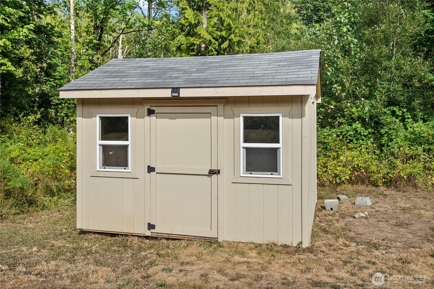 1870 Northwest Vaa Road Poulsbo, WA 98370 - Photo 5 of 40 a view of a house with backyard