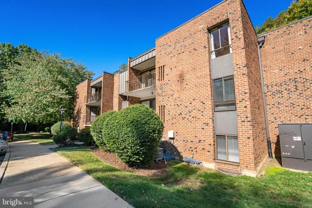 front view of a building with a yard