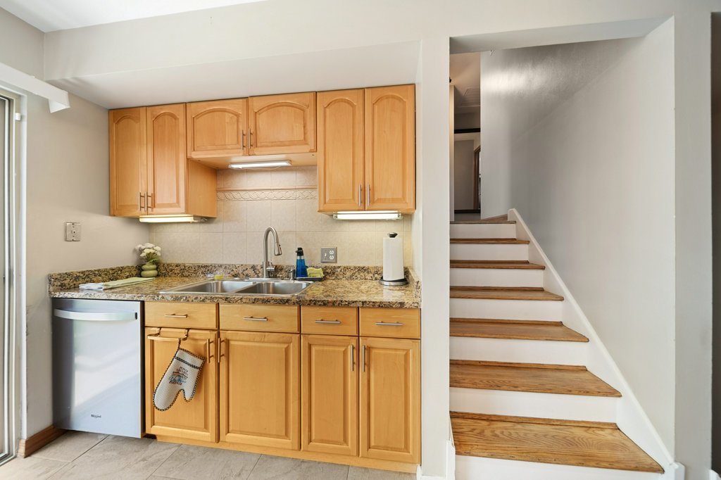 365 West Myrick Avenue Addison, IL 60101 - Photo 13 of 49 a kitchen with stove cabinets and entryway